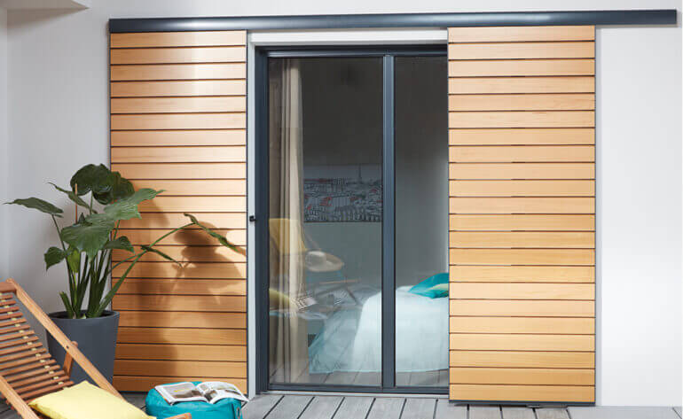 Volet coulissant bois et aluminium